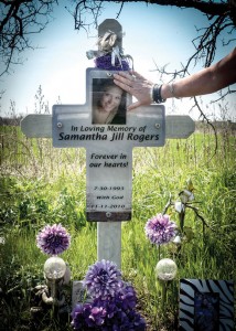 ROADSIDE MEMORIAL - A roadside memorial cross holds the photograph of Samantha Rogers. The 17-year-old and her best friend, Delaney Mancil, 15, both from Alvord, were killed in an accident Nov. 11, 2010, on U.S. 380 between Denton and the Wise County line. Messenger photo by Joe Duty