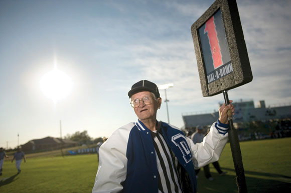 STANDING TALL - Coy O'Neal of Decatur awaits the start of an Eagle football game in 2008. This weekend the longtime sideline official and DHS graduate will celebrate his 80th birthday and 65th season pulling the chains. Messenger photo by Joe Duty