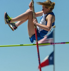 VAULTING TO THE TOP - Decatur's Darci Billmire clears the bar on her way to a first-place finish in the pole vault. Messenger photo by Joe Duty