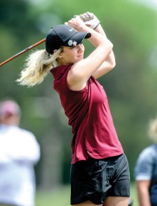 WINDY DAY - Tiffany Hawkins and the rest of the Sissies battled cool and windy conditions at the regional golf tournament. Messenger photo by Joe Duty
