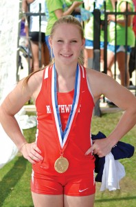 GOLDEN FINISH - Northwest's Desiree Freier (above) shows off her gold medal after winning the Class 5A state pole vaulting championship for the second straight year. Freier (right) makes her record breaking jump. Messenger photo by Mack Thweatt