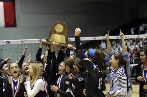 The Decatur Lady Eagles celebrate after winning their first-ever state volleyball title Saturday afternoon. Messenger photo by Joe Duty