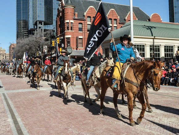 ON HORSEBACK - Devon employees took to the streets of Fort Worth Saturday to participate in the stock show parade. The Fort Worth Stock Show and Rodeo runs through Feb. 8, and Wise County folks will be participating as volunteers and competitors. Messenger photo by Joe Duty