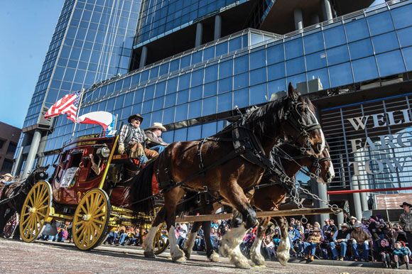 WAGONS HO! - The Wells Fargo stagecoach was one of more than 200 entries in Saturday's All Western Parade, the unoffficial kickoff to the Fort Worth Stock Show and Rodeo. Messenger photo by Joe Duty